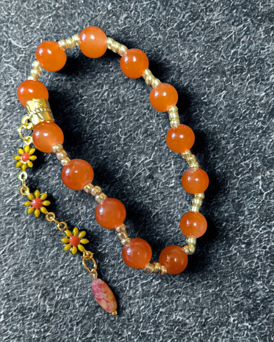 Handmade Orange Beaded Stretch Bracelet with Floral Charm Drop
