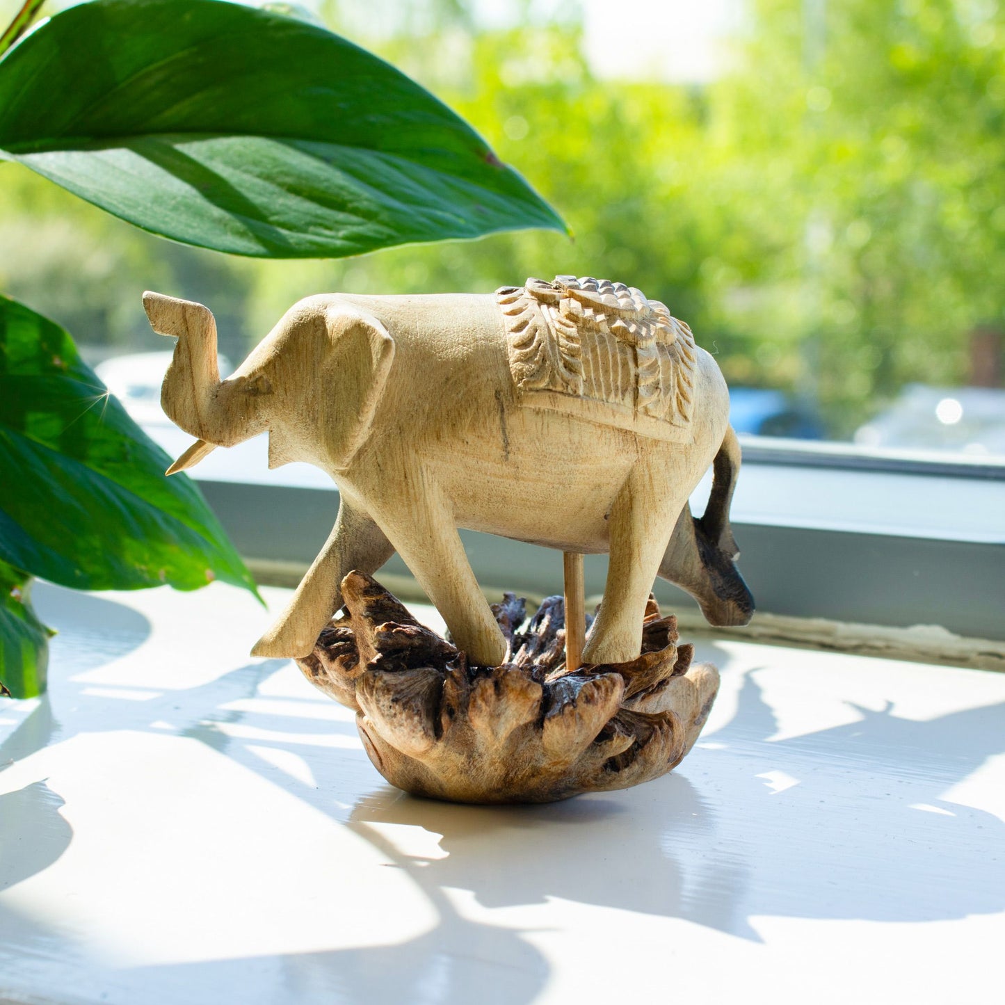 Hand-Carved Wooden Elephant Sculpture – Unique Artisan Décor with Natural Wood Base (9x11x10 cm)