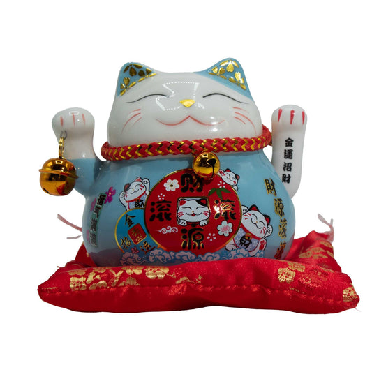 Blue Ceramic Money Cat (Maneki Neko) – Lucky Waving Cat Ornament on Red Cushion